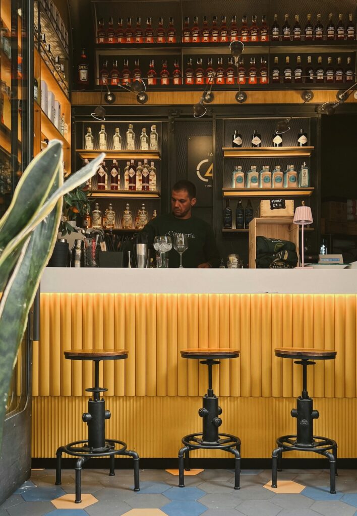 a bartender at a bar in Italy
