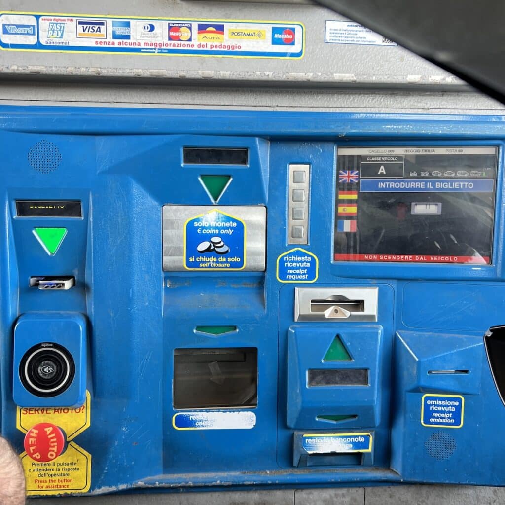 renting a car in italy toll booth